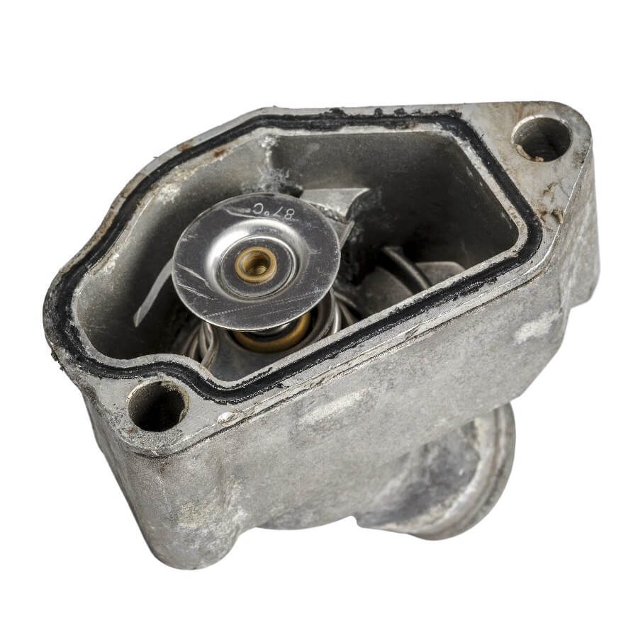 diesel engine cooling system thermostat in housing