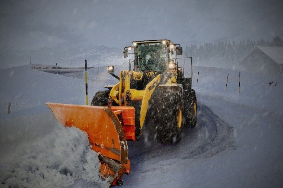 Komatsu diesel engine bulldozer in snow